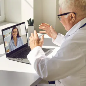 Doctor using remote patient monitoring in healthcare